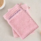 Gant de toilette en coton peigné rose, texture moelleuse